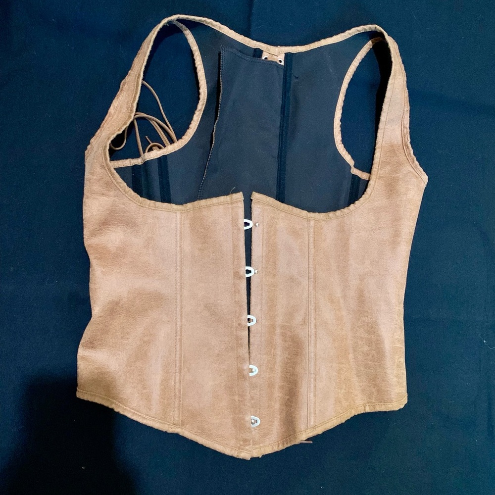Light brown suede corset.